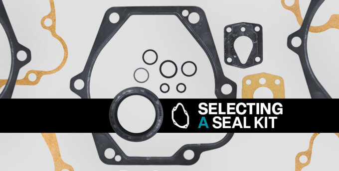 Components in a piston pump seal kit, including O-rings, gaskets, and washers on a gray background. A black banner with the words "Selecting a Seal Kit" appears at the forefront of the image.